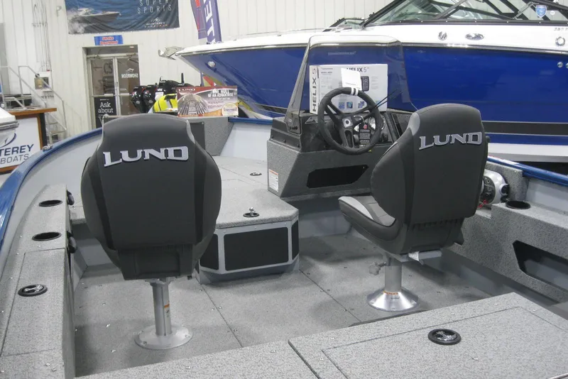 Slide: The Image of 2025 Lund 1675 Adventure SS boat with Mercury 60 engine in showroom. - 5
