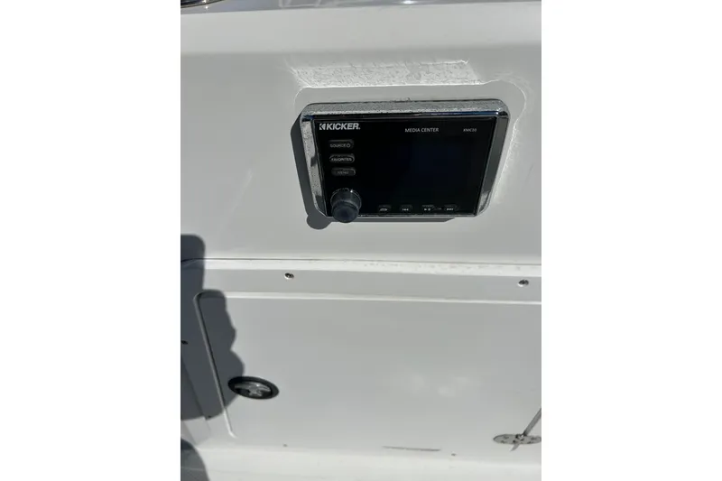 Slide: The Image of Kicker media center on 2017 Tahoe 2150 boat dashboard. - 14