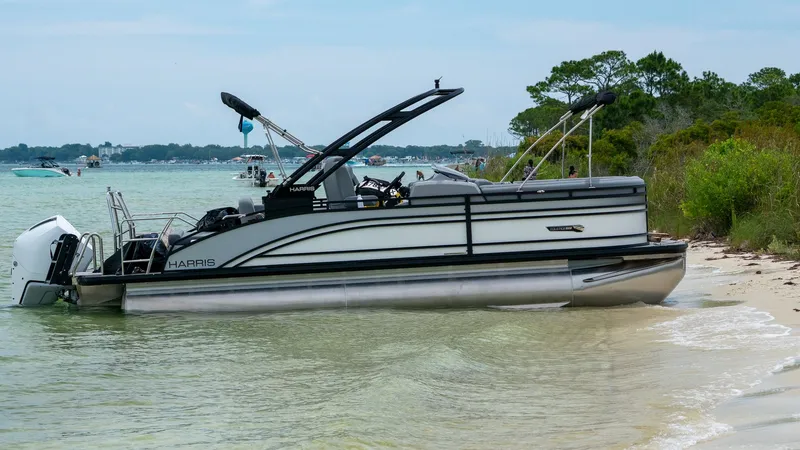 Slide: The Image of Harris Solstice 230 pontoon boat on beach, year 2026. - 0