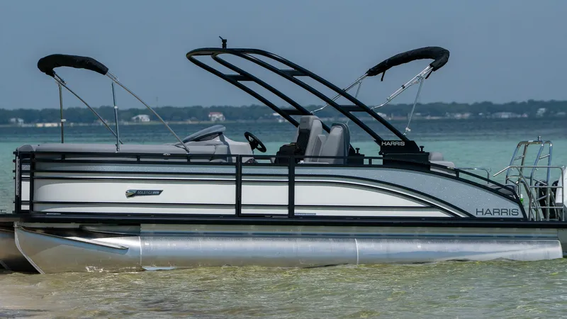 Slide: The Image of Harris Solstice 230 pontoon boat 2026 at the beach. - 4