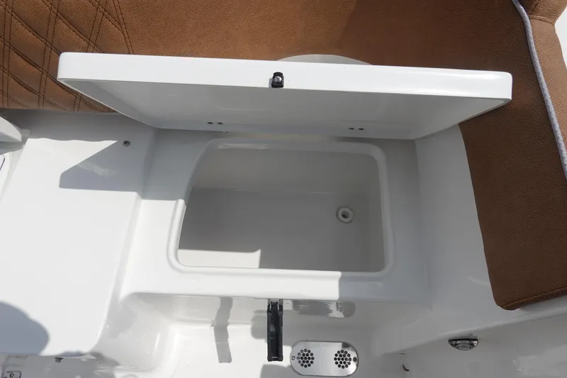 Slide: The Image of 2026 Sea Hunt Ultra 275 Coffin Box boat top view with rod holders and speakers. - 12