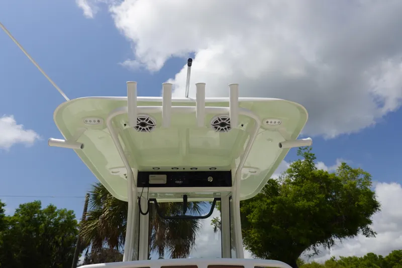 Slide: The Image of 2026 Sea Hunt Ultra 275 Coffin Box boat dashboard with Garmin displays and steering wheel. - 15