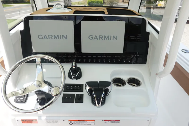 Slide: The Image of 2026 Sea Hunt Ultra 275 Coffin Box interior view with open lid. - 19