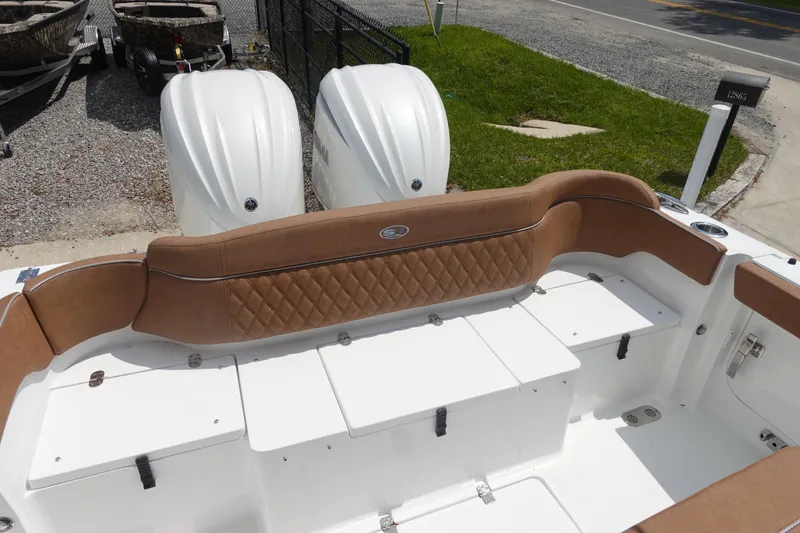 Slide: The Image of Open storage compartment on 2026 Sea Hunt Ultra 275 Coffin Box boat. - 9