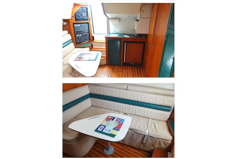 Slide: The Image of 1997 Pursuit 3000 Express interior with seating and storage area. - 10