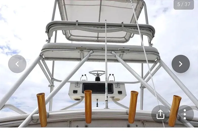 Slide: The Image of Interior of a 1997 Pursuit 3000 Express boat. - 3