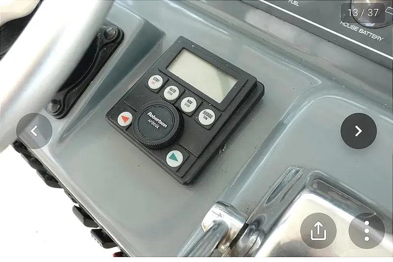 Slide: The Image of Dashboard of a 1997 Pursuit 3000 Express boat. - 8