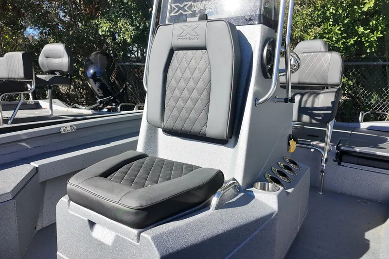 Slide: The Image of 2026 Xpress H20B Bay boat interior with sleek seating and modern design. - 10