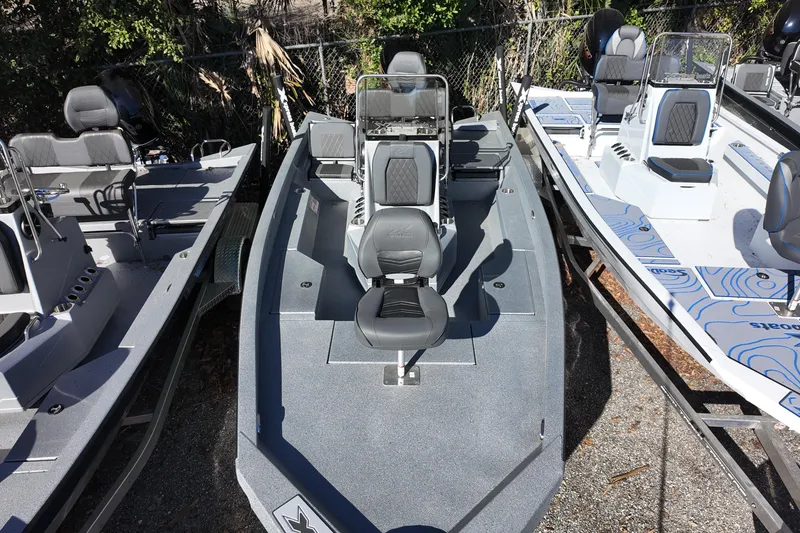 Slide: The Image of 2026 Xpress H20B Bay boat with sleek design and comfortable seating. - 8