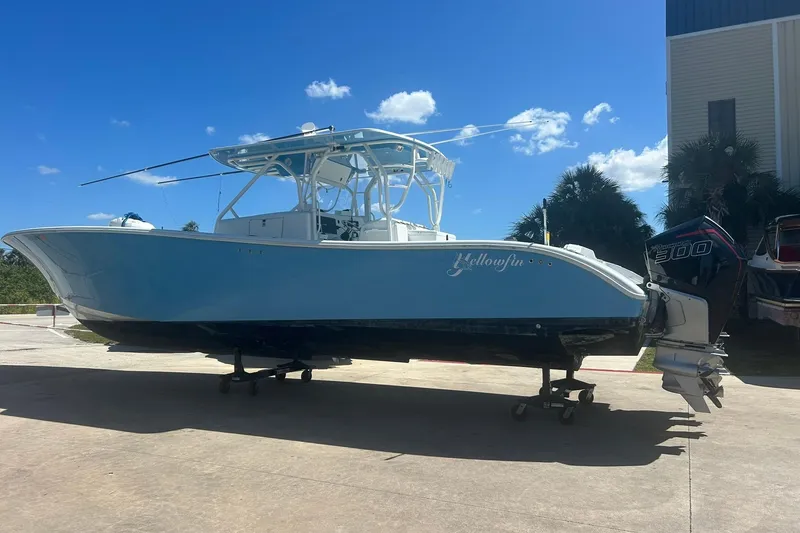 The Image of 2009 Yellowfin 42 Offshore boat with twin outboard engines on a sunny day. - 0