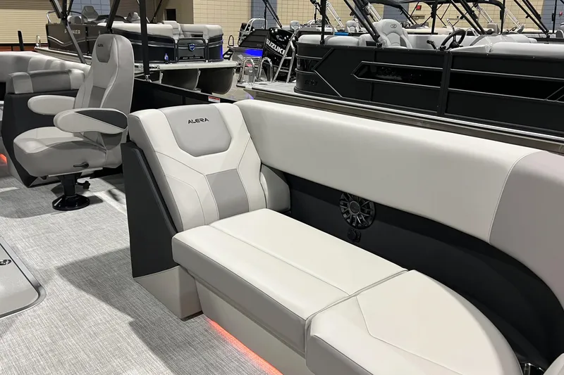 Slide: The Image of 2026 Alera A22Q boat interior with modern seating and sleek design. - 7