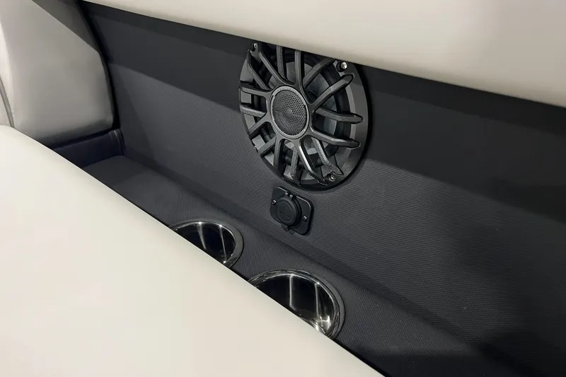 Slide: The Image of Speaker and cup holders in 2026 Alera A22Q interior. - 8