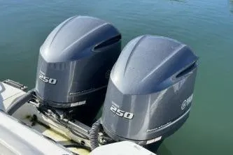 Slide: The Image of Twin Yamaha 250 outboard engines on a 2013 Everglades 275 Center Console boat. - 7