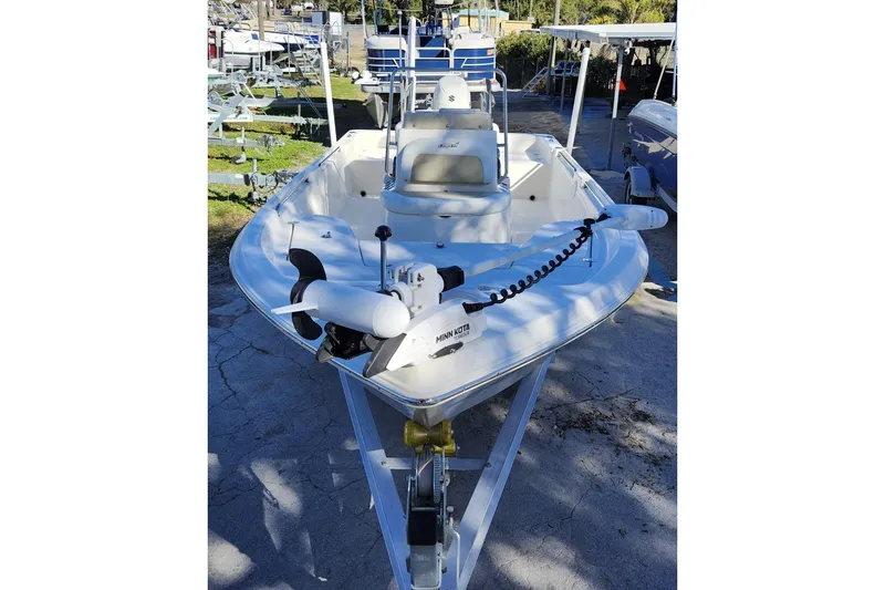 Slide: The Image of 2022 Bulls Bay 2000 boat on trailer, featuring Minn Kota trolling motor. - 12