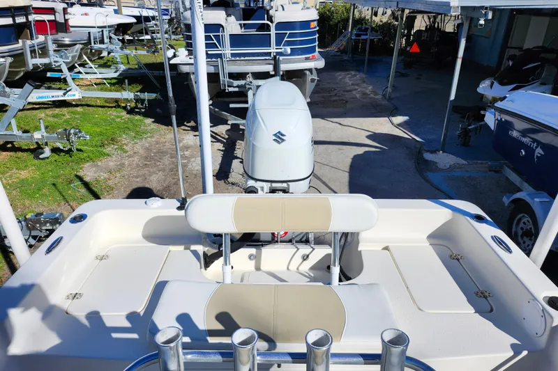 Slide: The Image of Bulls Bay 2000 boat, 2022 model, with Suzuki outboard motor in a marina setting. - 27