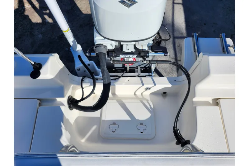 Slide: The Image of 2022 Bulls Bay 2000 boat engine area with SeaStar hydraulic steering system. - 32