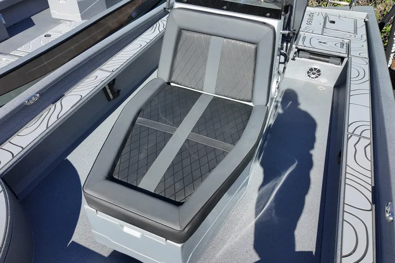 Slide: The Image of 2026 Xpress X23B Bay Lounge boat interior with sleek, modern seating design. - 11