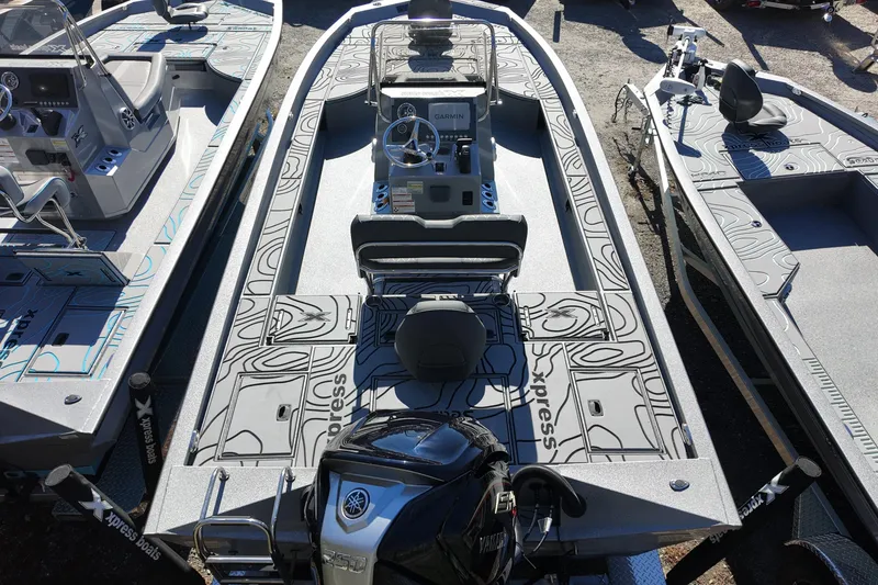Slide: The Image of 2026 Xpress X23B Bay Lounge boat with Yamaha engine, featuring modern design and spacious layout. - 15