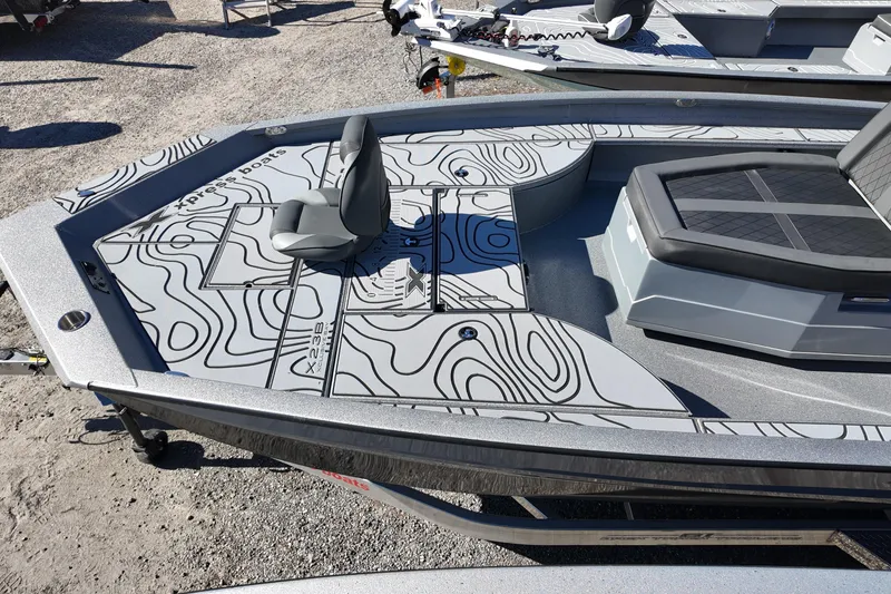 Slide: The Image of 2026 Xpress X23B Bay Lounge boat with stylish seating and modern design. - 17
