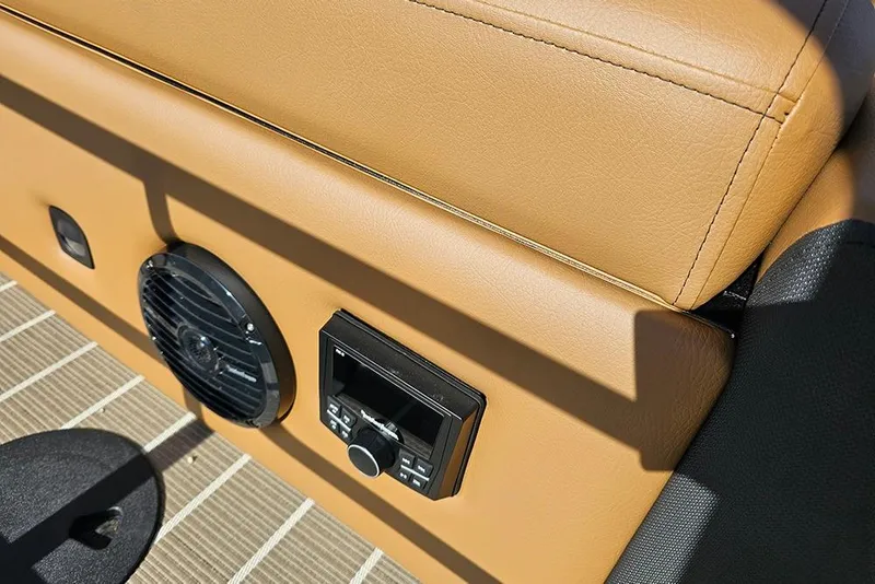 Slide: The Image of 2023 Bentley Pontoons 223 Elite Swingback DC interior with speaker and control panel. - 14