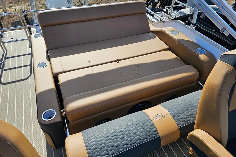 Slide: The Image of 2023 Bentley Pontoons 223 Elite Swingback DC interior with luxurious seating and cup holders. - 15