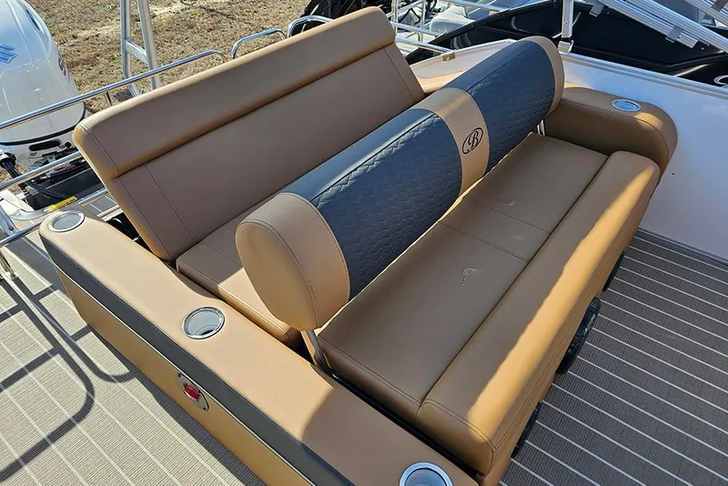 Slide: The Image of 2023 Bentley Pontoons 223 Elite Swingback DC with luxurious tan seating and cup holders. - 16
