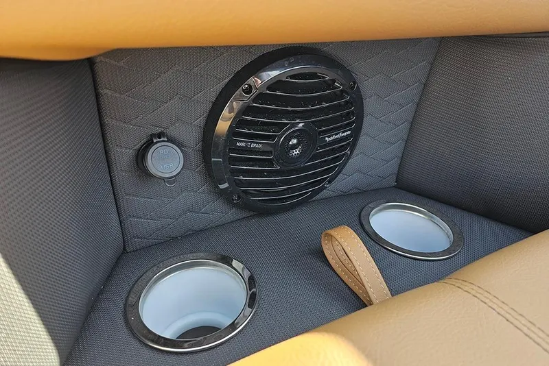 Slide: The Image of 2023 Bentley Pontoons 223 Elite Swingback DC interior with speaker, USB port, and cup holders. - 27