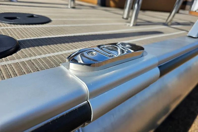 Slide: The Image of Close-up of 2023 Bentley Pontoons 223 Elite Swingback DC deck detail. - 30