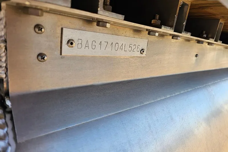 Slide: The Image of 2023 Bentley Pontoons 223 Elite Swingback DC hull identification number plate. - 31