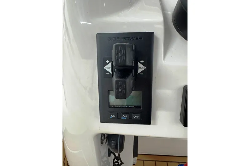 Slide: The Image of Side-Power control panel on 2019 Intrepid 345 Nomad FE boat dashboard. - 23