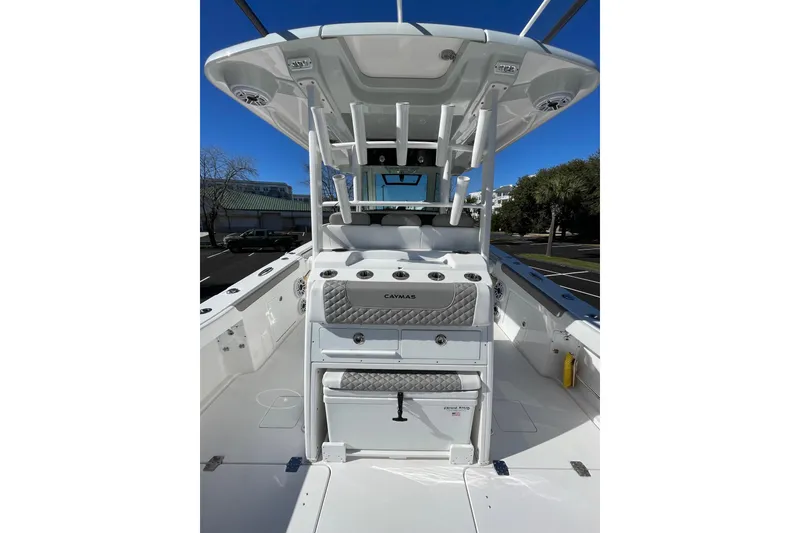 Slide: The Image of 2024 Caymas 34 CT boat interior with seating and storage, showcasing modern design. - 19