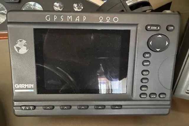 Slide: The Image of Garmin GPSMAP 220 on 1995 Bayliner 3988 Motoryacht dashboard. - 11