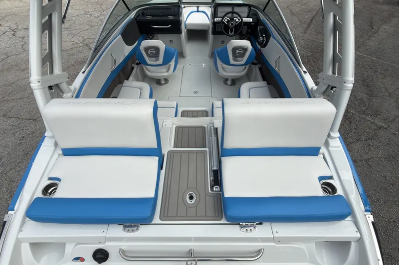 Slide: The Image of 2026 Crownline 220 SS boat interior with blue and white seating, modern design. - 16