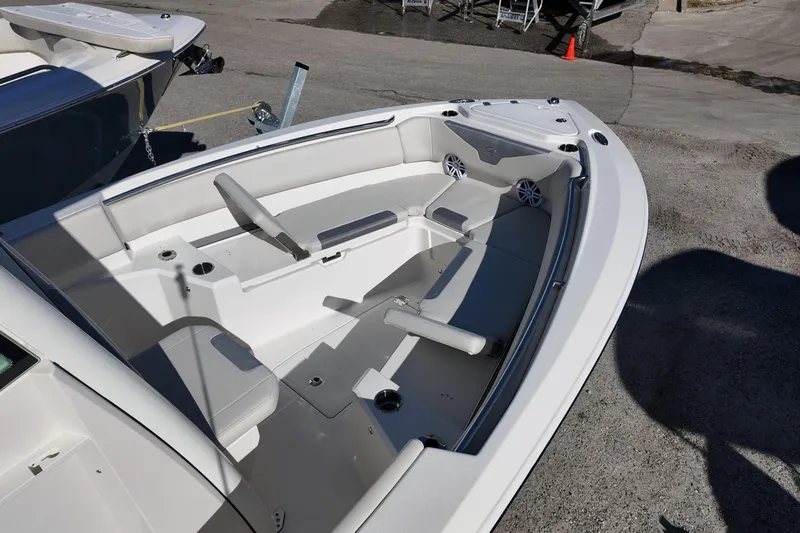 Slide: The Image of 2026 Sailfish 252 CC boat interior with seating and storage compartments. - 7