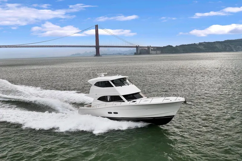 The Image of 2014 Maritimo M50 yacht cruising near Golden Gate Bridge on a sunny day. - 0