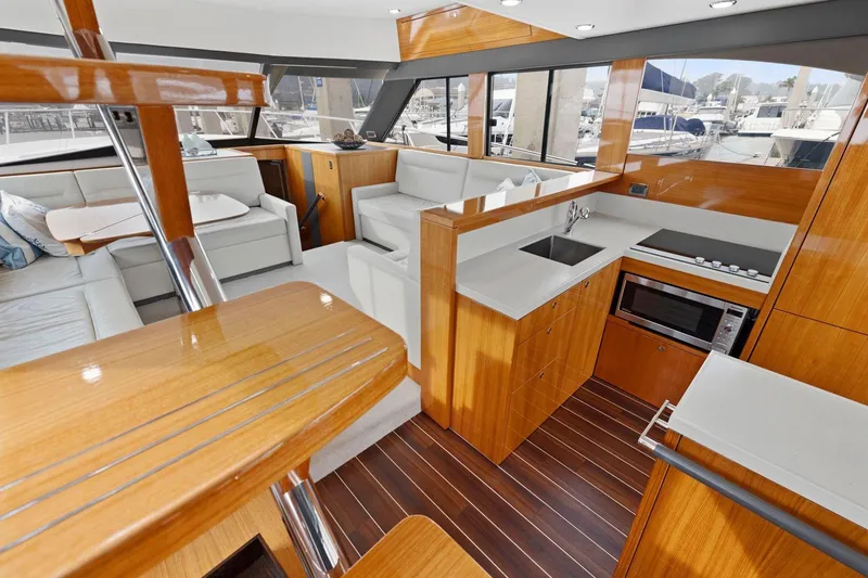 Slide: The Image of Luxurious interior of 2014 Maritimo M50 yacht with modern kitchen and seating area. - 43