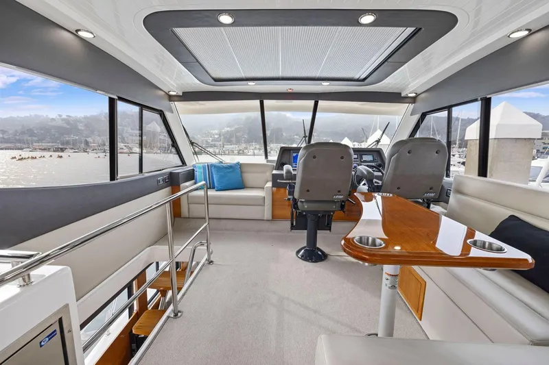 Slide: The Image of Luxurious interior of 2014 Maritimo M50 yacht with panoramic windows and elegant seating. - 53