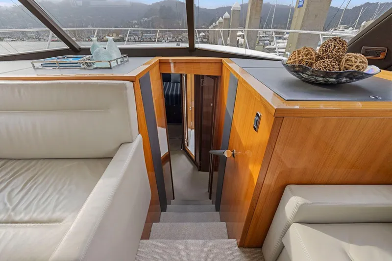 Slide: The Image of Luxurious interior of 2014 Maritimo M50 yacht with elegant wood finish and modern decor. - 56
