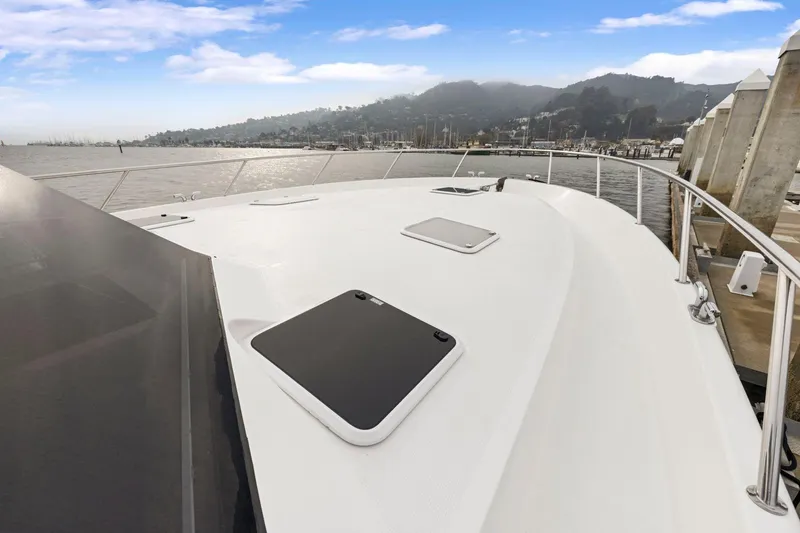 Slide: The Image of 2014 Maritimo M50 yacht deck with scenic harbor view. - 81