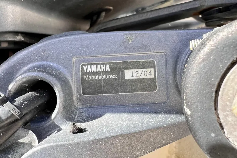 Slide: The Image of Close-up of Yamaha engine part, manufactured December 2004, on a 2005 Parker 2820 XLD Sport Cabin. - 17