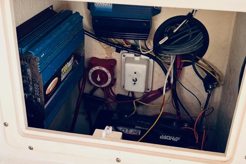 Slide: The Image of Electrical components inside a 2005 Parker 2820 XLD Sport Cabin boat. - 13