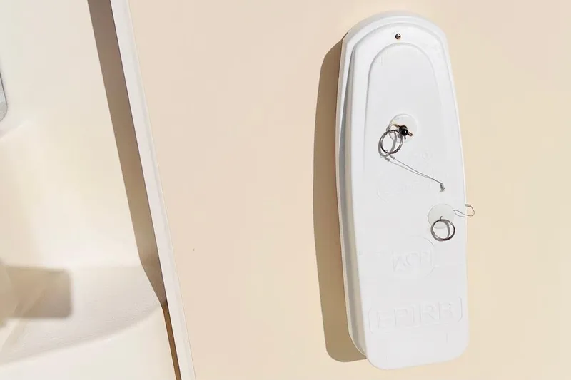 Slide: The Image of White EPIRB mount on Parker 2820 XLD Sport Cabin, 2005 model. - 14