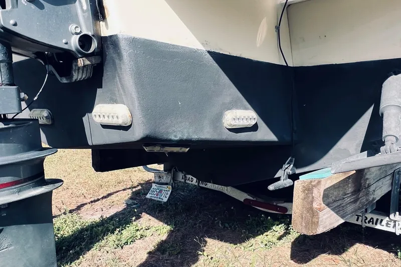 Slide: The Image of Rear view of a 2005 Parker 2820 XLD Sport Cabin boat on a trailer. - 7