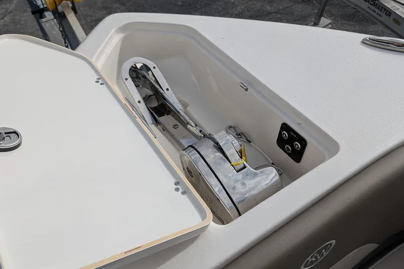 Slide: The Image of 2023 Key West 263 FS boat anchor compartment with open hatch. - 22