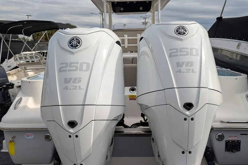 Slide: The Image of Twin Yamaha 250 V6 4.2L engines on 2023 Key West 263 FS boat. - 4