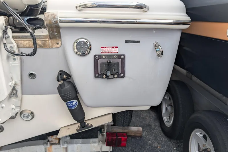 Slide: The Image of 2023 Key West 263 FS boat transom with trim tab and hardware. - 5
