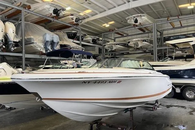 The Image of 2011 Chris-Craft Launch 22 boat in indoor storage facility. - 0