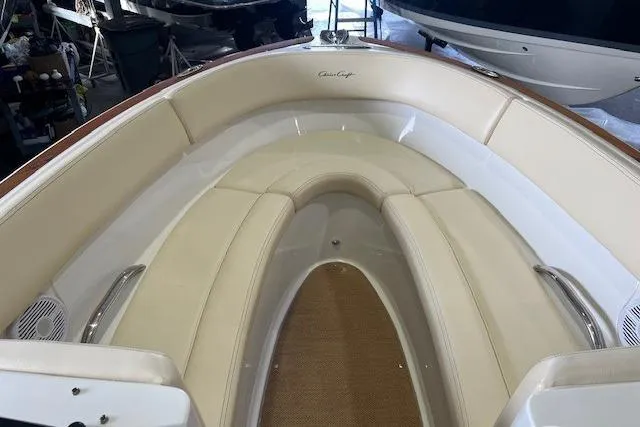 Slide: The Image of 2011 Chris-Craft Launch 22 boat interior with beige seating and elegant design. - 21