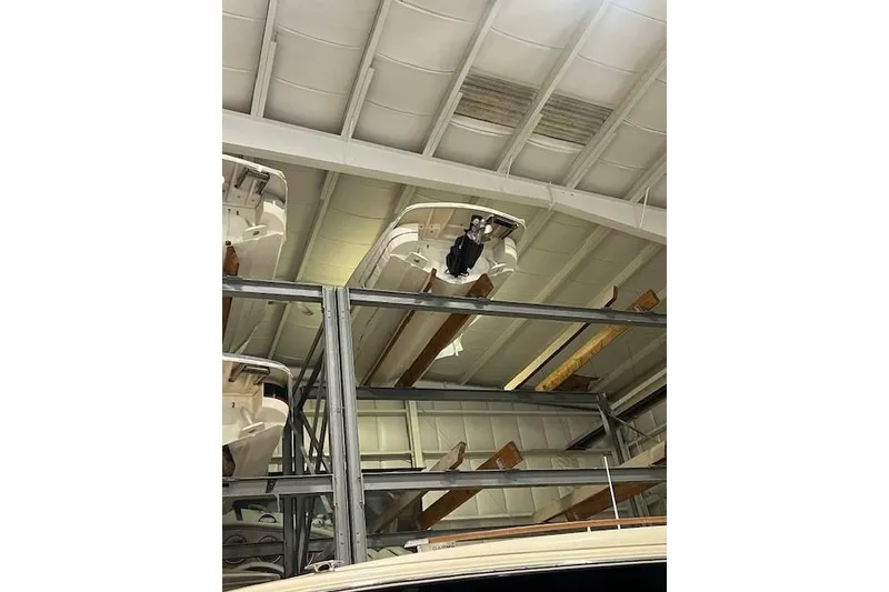 Slide: The Image of 2011 Chris-Craft Launch 22 boats stored in a warehouse. - 28