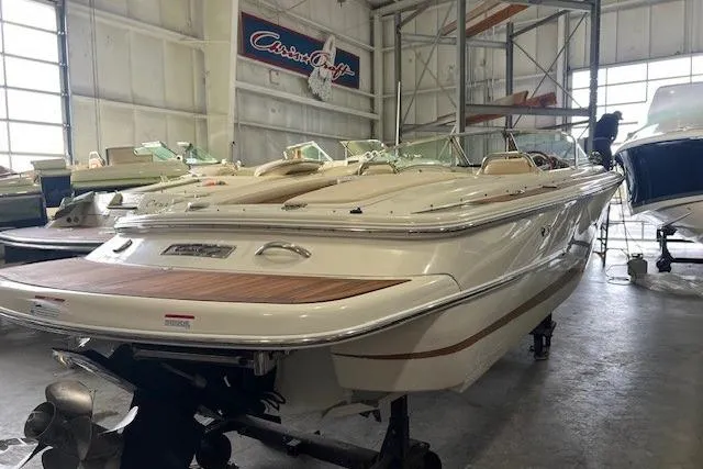 Slide: The Image of 2011 Chris-Craft Launch 22 boat in a showroom, showcasing elegant design and craftsmanship. - 3